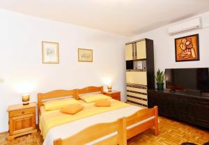 Posteľ alebo postele v izbe v ubytovaní Apartments Snjeza