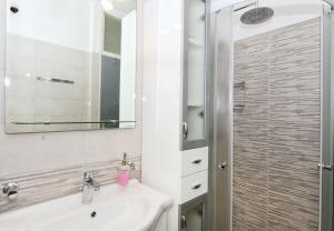 Kúpeľňa v ubytovaní Apartments Snjeza