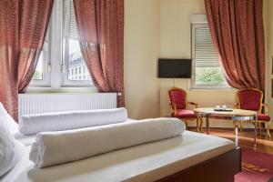 TV i/ili multimedijalni sistem u objektu Hotel Riviera