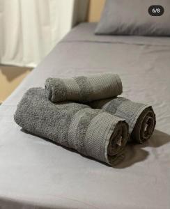 a pile of towels sitting on top of a bed at Pousada Licuri in Ibicoara +60 photos