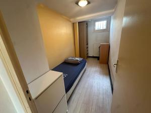 Ένα ή περισσότερα κρεβάτια σε δωμάτιο στο Appartement Quais de Grenoble