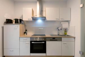 Kuchyň nebo kuchyňský kout v ubytování Wohnung 4 Rosenstraße
