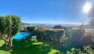 an aerial view of a yard with a swimming pool at Villa Blue Sky Cape Town in Cape Town