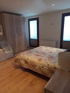 Postel nebo postele na pokoji v ubytování Apartament ROURE de Molló Parc