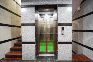 Fotografie z fotogalerie ubytování FabHotel SN Residency - Chord Road v destinaci Bengalúr + 22 fotografií