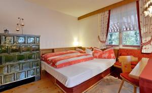 Ένα ή περισσότερα κρεβάτια σε δωμάτιο στο Haus Madlen