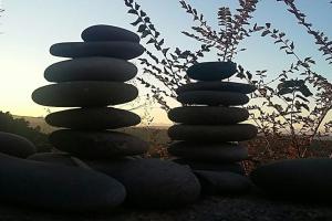 a group of rocks stacked on top of each other at La chambre dans la roche in Saint-Martin