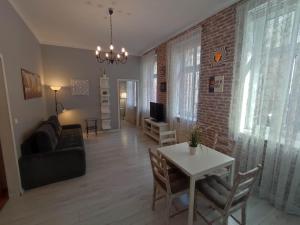 Μια τηλεόραση ή/και κέντρο ψυχαγωγίας στο KGHN Apartments Tkacka