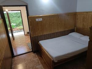 Letto o letti in una camera di Trilan Cottages - Donnington Road