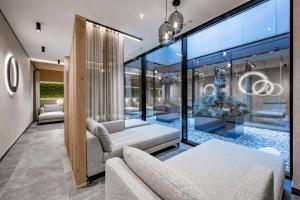 Postel nebo postele na pokoji v ubytování Ruhpoldinger Hof - Hotel & Wellness