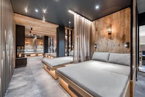 Postel nebo postele na pokoji v ubytování Ruhpoldinger Hof - Hotel & Wellness