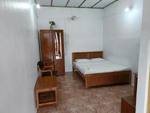 Letto o letti in una camera di Trilan Cottages - Donnington Road