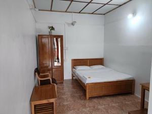 Letto o letti in una camera di Trilan Cottages - Donnington Road
