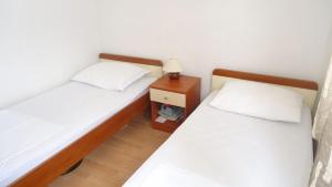 Postel nebo postele na pokoji v ubytování Apartment Pava