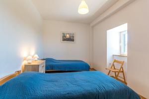 Postel nebo postele na pokoji v ubytování House Stone + 25 fotografií