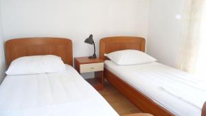Postel nebo postele na pokoji v ubytování Apartment Pava