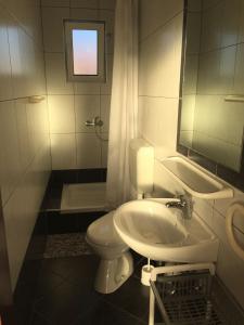 Kúpeľňa v ubytovaní Apartments Durda