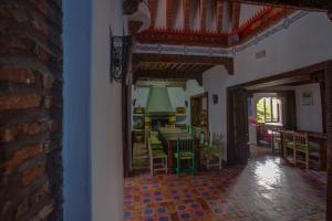 a view of a dining room and living room at Dar Baibou in Chefchaouen