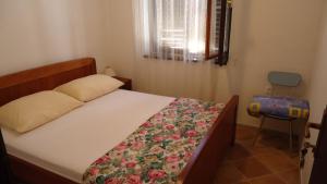 Postel nebo postele na pokoji v ubytování Apartment Pava