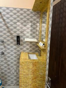 Ein Badezimmer in der Unterkunft Hotel Krishna Paradise