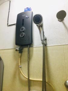 a hair dryer is plugged into a wall at Sakula Villa Inn in Weligama +61 photos