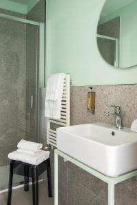 Koupelna v ubytování Hotel Fiorita