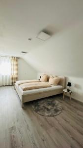 Ένα ή περισσότερα κρεβάτια σε δωμάτιο στο Stilvolles Apartment