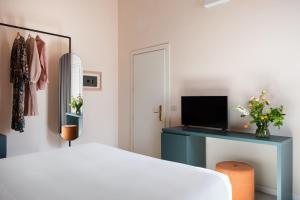 TV a/nebo společenská místnost v ubytování Hotel Fiorita