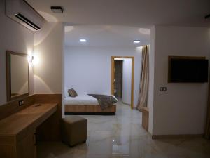 Hotel Djerba Inn客房内的一张或多张床位
