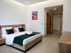 Hotel Djerba Inn客房内的一张或多张床位