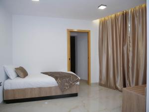 Hotel Djerba Inn客房内的一张或多张床位