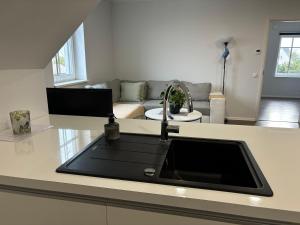 Kuchyň nebo kuchyňský kout v ubytování Pärnu Lubja Apartments