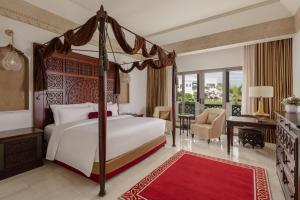 Voodi või voodid majutusasutuse Sharq Village & Spa, a Ritz-Carlton Hotel toas