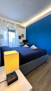 Katil atau katil-katil dalam bilik di Trastevere Welcome Home Deluxe