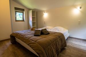 Postel nebo postele na pokoji v ubytování Chalets de la Wormsa