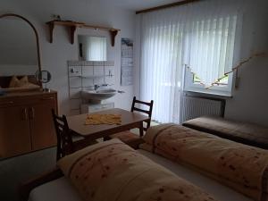 Ένα ή περισσότερα κρεβάτια σε δωμάτιο στο Haus Maier