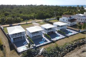 Trujillo AltoにあるVilla Familiar frente al mar Puerto Ricoの家の航空写真