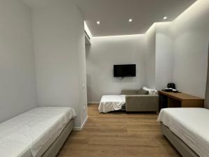 Voodi või voodid majutusasutuse Hotel Vila Zeus toas