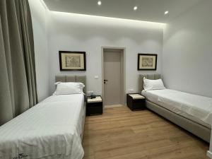 Voodi või voodid majutusasutuse Hotel Vila Zeus toas