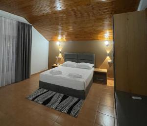 Postel nebo postele na pokoji v ubytování Hotel Milano