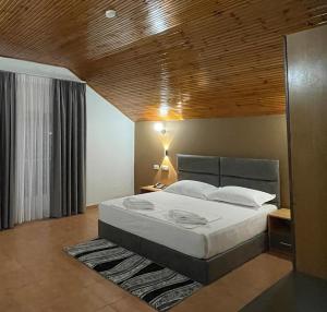 Postel nebo postele na pokoji v ubytování Hotel Milano