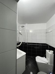 Koupelna v ubytování Hotel Milano