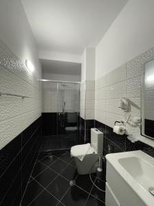 Koupelna v ubytování Hotel Milano