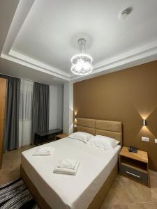 Postel nebo postele na pokoji v ubytování Hotel Milano