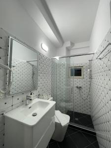 Koupelna v ubytování Hotel Milano