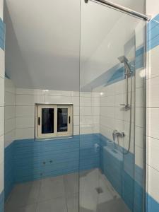 Koupelna v ubytování Hotel Milano
