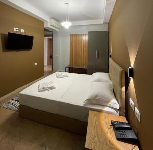 Postel nebo postele na pokoji v ubytování Hotel Milano