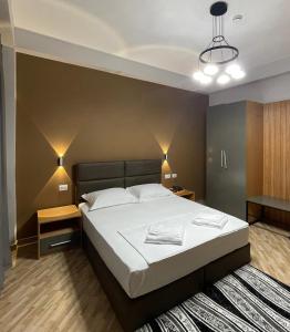 Postel nebo postele na pokoji v ubytování Hotel Milano