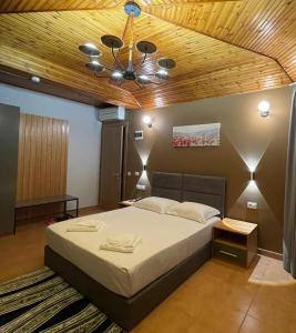 Postel nebo postele na pokoji v ubytování Hotel Milano