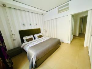 Posteľ alebo postele v izbe v ubytovaní Interno 5 B&B